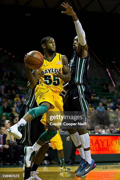 Pierre Jackson of the Baylor University Bears drives to the basket against the USC Upstate Spartans on December 17, 2012 at the Ferrell Center in...
