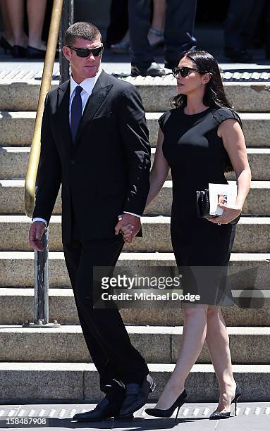 James Packer and wife Erica Packer leave after attending the Dame Elisabeth Murdoch public memorial at St Paul's Cathedral on December 18, 2012 in...