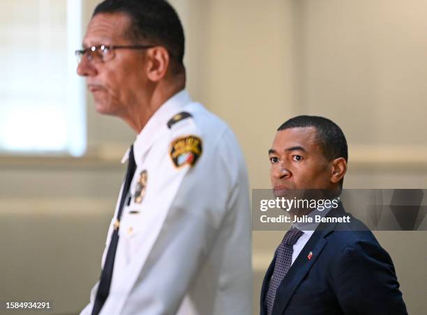 Montgomery Mayor Steven Reed, right, listens to Police Chief Darryl J. Albert speak to the press regarding the brawl that occurred Saturday on the...