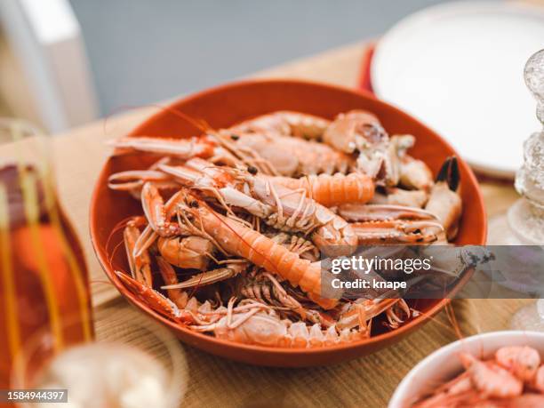 nephrops norvegicus norway lobsters and shrimps seafood dinner - scampi stock pictures, royalty-free photos & images