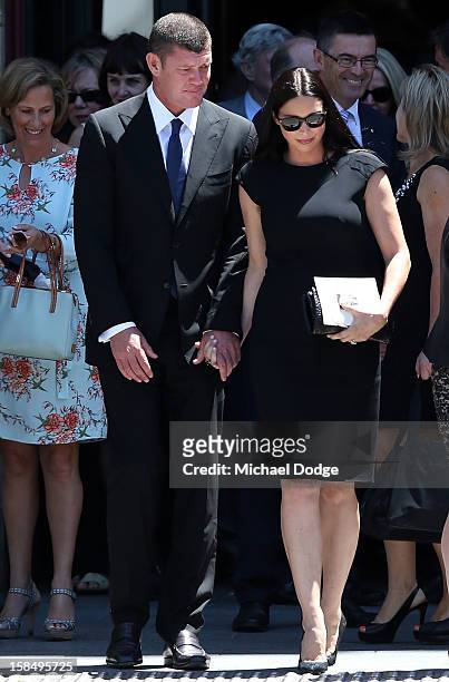 James Packer and wife Erica Packer leave after attending the Dame Elisabeth Murdoch public memorial at St Paul's Cathedral on December 18, 2012 in...