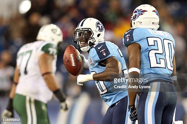 Cornerback Jason McCourty of the Tennessee Titans celebrates after an interception against quarterback Mark Sanchez of the New York Jets at LP Field...