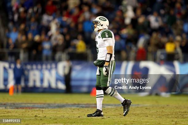 Quarterback Mark Sanchez of the New York Jets walks off the field after a play in the fourth quarter against the Tennessee Titans at LP Field on...