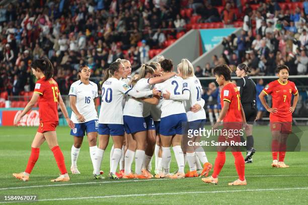 Alessia Russo of England celebrates with team mates after scoring her team's first goal during the FIFA Women's World Cup Australia & New Zealand...
