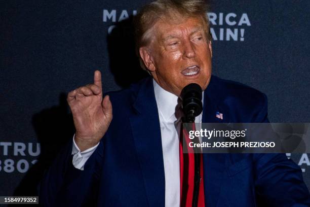 Former US President and 2024 presidential hopeful Donald Trump speaks during a campaign rally at Windham High School in Windham, New Hampshire, on...