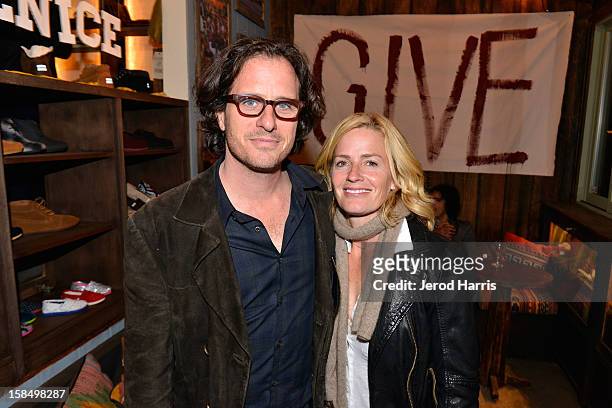 Director Davis Guggenheim and actress Elisabeth Shue attend the Grand Opening of TOMS official flagship store on Venice's Abbot Kinney Blvd on...
