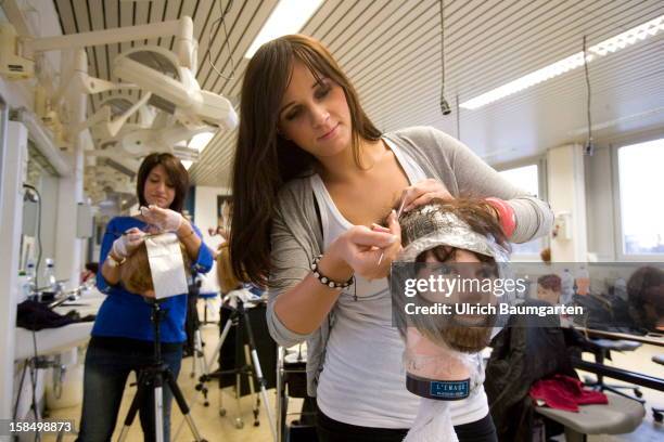 Apprenticeship as hairdresser machines mechanic in the Butzweilerhof education center of chamber of commerce Cologne on December 10, 2012 in Cologne,...