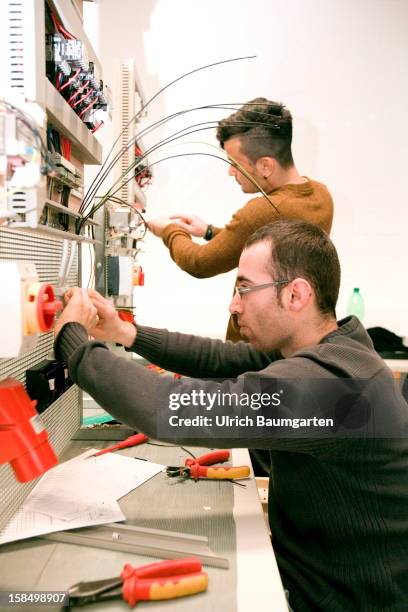 Apprenticeship as electrician machines mechanic in the Butzweilerhof education center of chamber of commerce Cologne on December 10, 2012 in Cologne,...