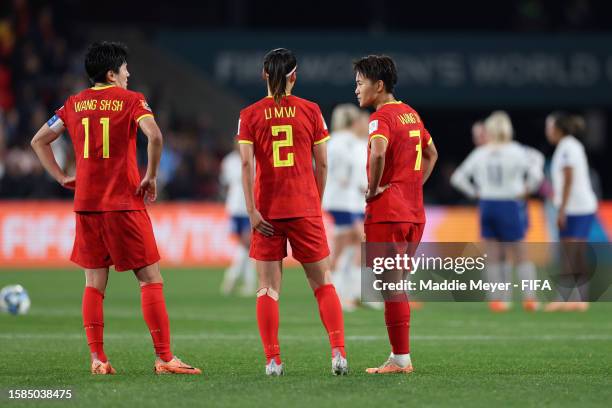 Wang Shanshan, Li Mengwen and Wang Shuang of China PR react during the FIFA Women's World Cup Australia & New Zealand 2023 Group D match between...