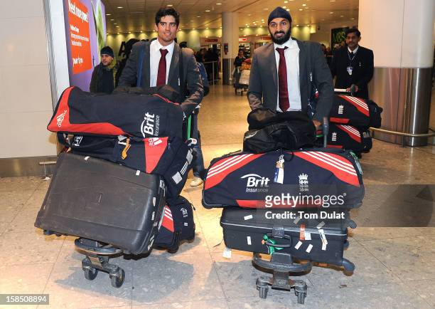 England Cricket Team Captain Alastair Cook and Monty Panesar arrive at Heathrow Airport on December 18, 2012 in London, England.
