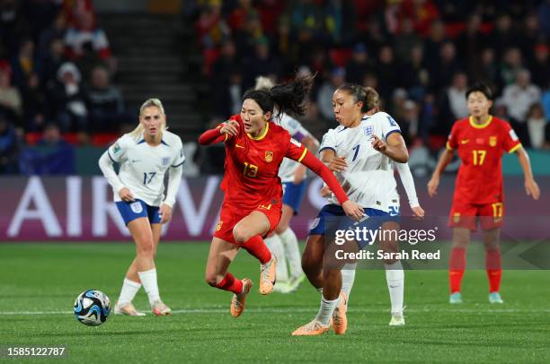 Yang Lina of China PR is challenged by Lauren James of England during the FIFA Women's World Cup Australia & New Zealand 2023 Group D match between...