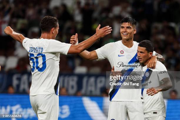 Stefano Sensi of Inter celebrates his goal with his teammate during the pre-season friendly match between Paris Saint-Germain and FC Internazionale...