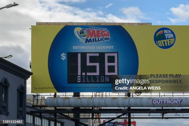 An electronic billboard displays the Mega Millions lottery jackpot at 1.58 billion USD, in New York City on August 08, 2023. If won, it would be the...