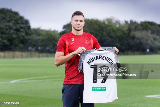 Mykola Kuharevich poses for a picture after signing contract with Swansea City AFC at Fairwood Training Ground on July 31, 2023 in Swansea, Wales.