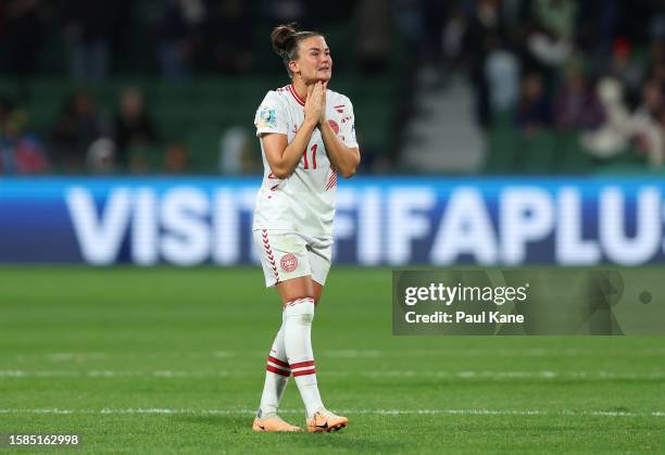 Katrine Veje of Denmark celebrates her team's 2-0 victory confirming the team’s qualification for the knockout stage following the FIFA Women's World...