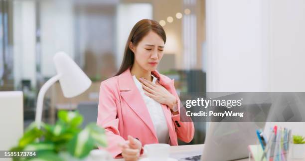 woman has acid reflux - vomit stock pictures, royalty-free photos & images