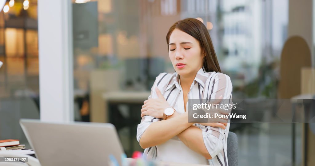 Businesswoman feel cold