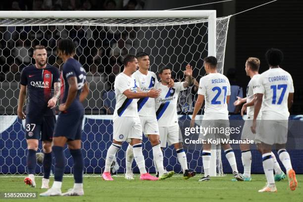 Stefano Sensi of Inter celebrates the team's second goal during the pre-season friendly match between Paris Saint-Germain and FC Internazionale on...