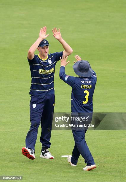 Eddie Jack of Hampshire is congratulated after catching Ryan Higgins of Middlesex off the bowling of Nick Gubbins during the Metro Bank One Day Cup...