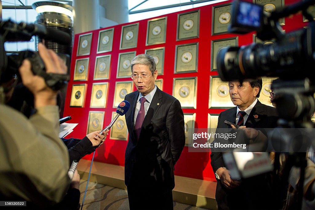 Fu Yuning Fu Yuning, chairman of China Merchants Group Ltd., center, and Hu ...