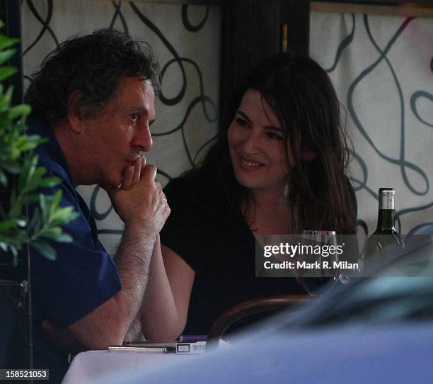 Nigella Lawson and Charles Saatchi are seen on August 28, 2009 in London, England.