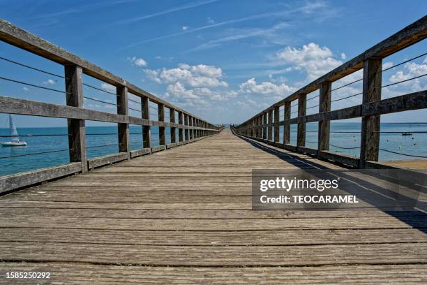 pontoon of the dames beach in noirmoutier - noirmoutier stockfoto's en -beelden