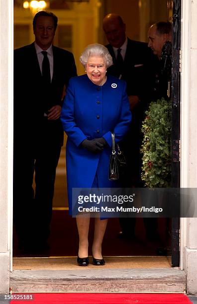 Queen Elizabeth II leaves Number 10 Downing Street after attending the Government's weekly Cabinet meeting on December 18, 2012 in London, England....