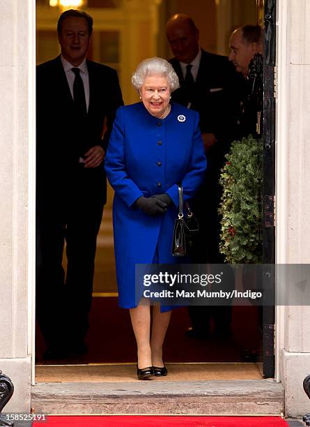 Queen Elizabeth II leaves Number 10 Downing Street after attending the Government's weekly Cabinet meeting on December 18, 2012 in London, England....