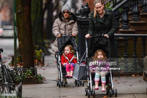 Actress Sarah Jessica Parker, Marion Broderick, and Tabitha Broderick walk to school on December 17, 2012 in New York City.