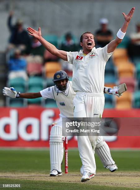 Peter Siddle of Australia appeals successfully for the wicket of Thilan Samaraweera of Sri Lanka during day five of the First Test match between...