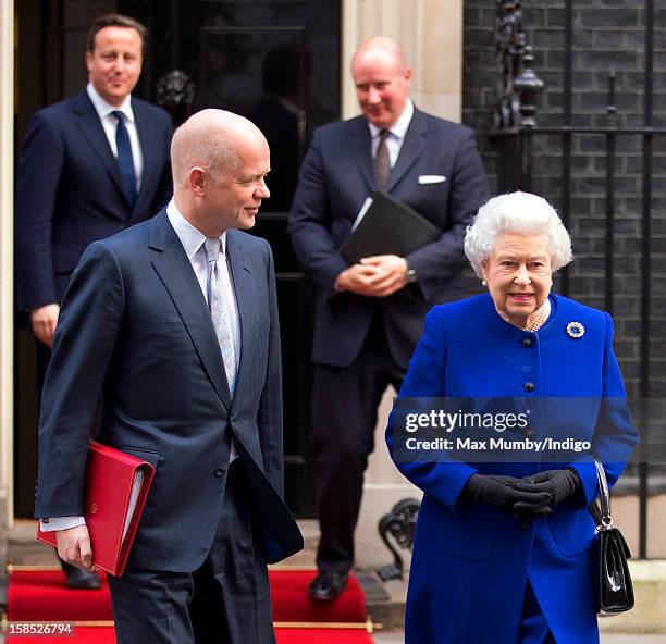 British Foreign Secretary William Hague and Queen Elizabeth II leave Number 10 Downing Street after attending the Government's weekly Cabinet meeting...