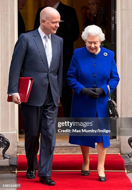 British Foreign Secretary William Hague and Queen Elizabeth II leave Number 10 Downing Street after attending the Government's weekly Cabinet meeting...