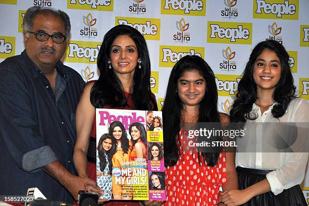 Indian Bollywood actress Sridevi , with husband Boney Kapoor , daughters Khushi and Jhanvi Kapoor pose during the unveiling of the latest Indian...