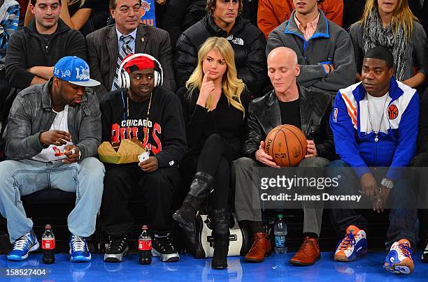 Cent, guest, Kate Upton, guest and Tracy Morgan attend the Houston Rockets vs New York Knicks game at Madison Square Garden on December 17, 2012 in...