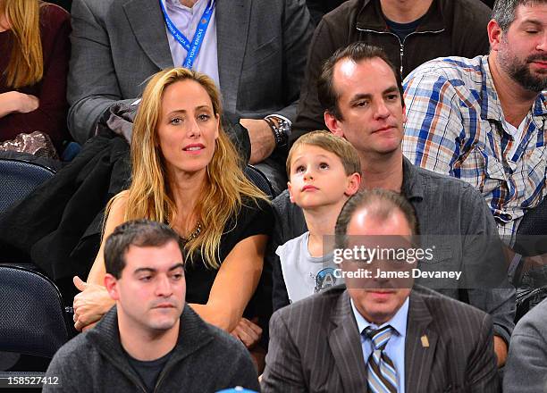 Kim Raver and family attend the Houston Rockets vs New York Knicks game at Madison Square Garden on December 17, 2012 in New York City.