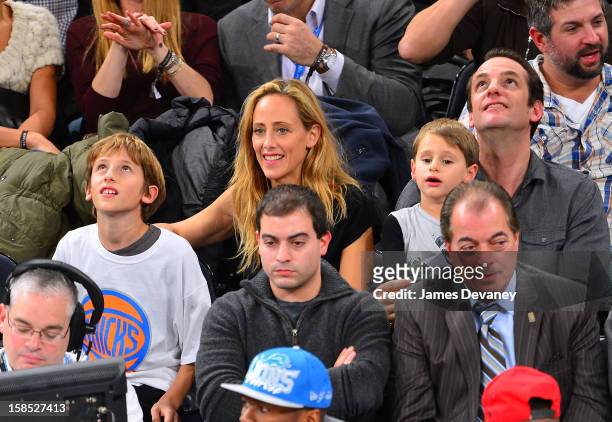 Kim Raver and family attend the Houston Rockets vs New York Knicks game at Madison Square Garden on December 17, 2012 in New York City.