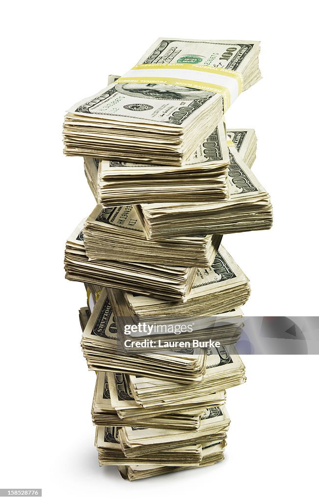 A tall stack of bundled of 100 US dollar bills