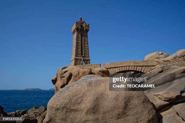 mean ruz lighthouse on the customs trail in perros-guirec - cotes darmor stock pictures, royalty-free photos & images
