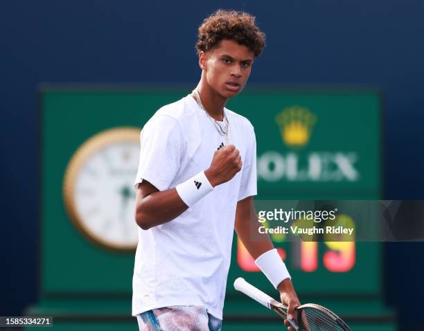 Gabriel Diallo of Canada reacts against Daniel Evans of Great Britain during Day Two of the National Bank Open, part of the Hologic ATP Tour, at...