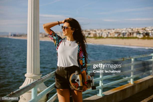 at the ocean pier in los angeles - manhattan beach stock pictures, royalty-free photos & images