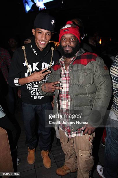 Recording artist D.King and Smif-N-Wessun's Tek attend "Cans For Cocktails" on December 17, 2012 in New York City.