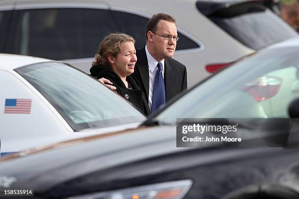 Family and friends depart the funeral for shooting victim Jessica Rekos at the St. Rose of Lima Catholic church on December 18, 2012 in Newtown,...