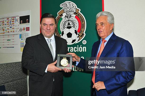 Jesus Mena , director of the CONAD and Justino Compean , president of the Mexican Football Federation, pose for a photo during a visit to the...