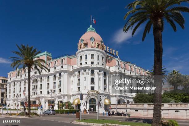 promenade des anglais, the hotel negresco - nice promenade des anglais photos et images de collection