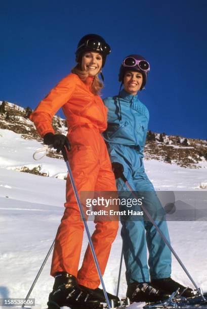Sporting Look: View of fashion models wearing parachute nylon jumpsuits designed by Michele Rosier on Saint Nizier hill. Grenoble, France 3/6/1967...