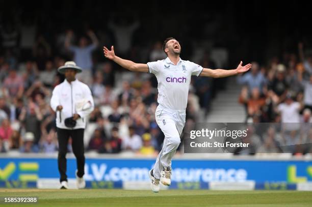 England bowler Mark Wood celebrates the wicket of Marnus Labuschagne during day five of the LV= Insurance Ashes 5th Test Match between England and...