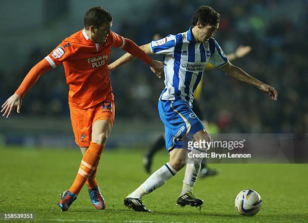 Will Buckley of Brighton & Hove Albion avoids Shane Lowry of Millwall during the npower Championship match between Brighton and Hove Albion and...