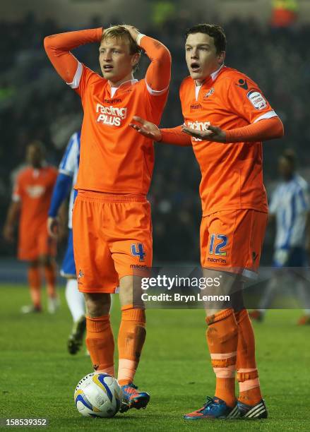 Josh Wright and Shane Lowry of Millwall react during the npower Championship match between Brighton and Hove Albion and Millwall at the Amex Stadium...