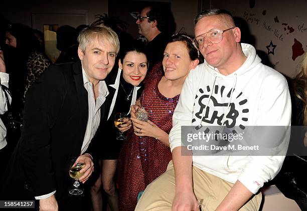 Nick Rhodes, Nefer Suvio' Katie Grand and Giles Deacon attend the Katie Grand & Olivier Rousteing LOVE Christmas Party, hosted by Balmain, at...