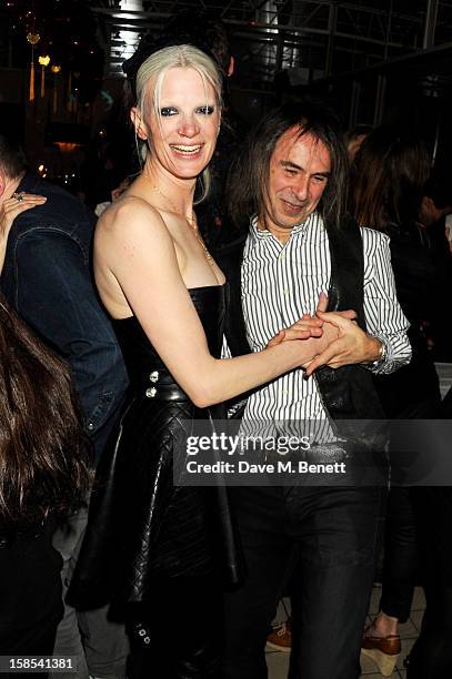 Kristen McMenamy and Ivor Braka attend the Katie Grand & Olivier Rousteing LOVE Christmas Party, hosted by Balmain, at Shrimpy's on December 18, 2012...